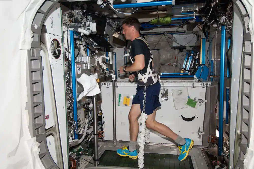 astronaut exercising onboard the ISS