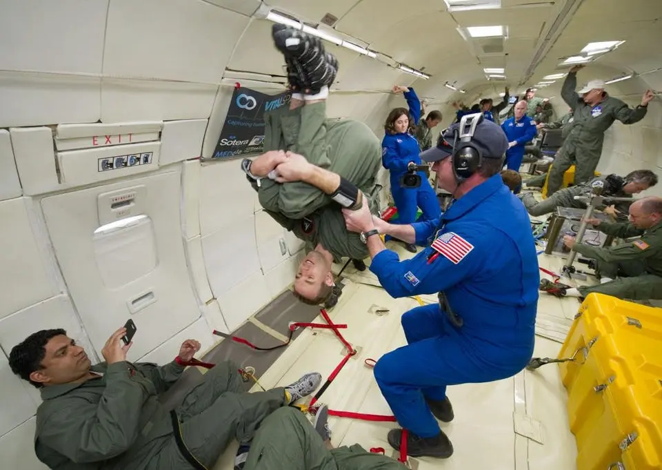 astronaut training inside reduced gravity aircraft