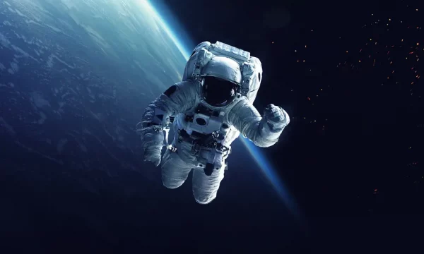 astronauts floating in space